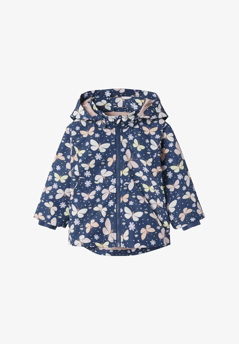 Marine regenjas met een capuchon, bloemen- en vlinderpatronen in pastelkleuren, vooraan met ritssluiting en elastische manchetten. Waterafstotend materiaal.