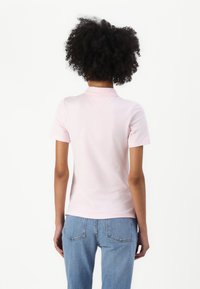 Tommy Hilfiger Polo shirt - light pink