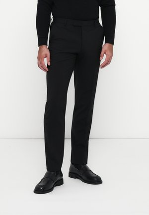 LEON - Stoffhose - black