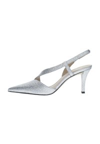 Talons aiguilles argentés scintillants à bride arrière avec un bout pointu, des fines lanières et un talon de 6,5 cm. Doublure intérieure lisse et semelle extérieure en caoutchouc noire.