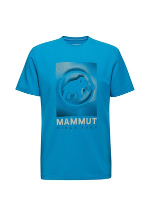 Niebieska bawełniana koszulka z grafiką mamuta w okrągłym wzorze, z beżowym napisem "MAMUT OD 1862" na dole.