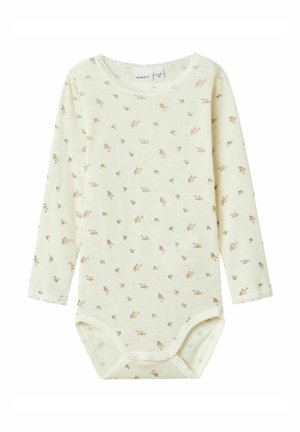 Langarm-Babybodysuit in hellgelb mit kleinem Blumenmuster. Hergestellt aus weichem Stoff, mit Spitzenbesatz und Druckknöpfen am Boden.
