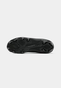 Semelle de chaussure de sport noire avec un design angulaire, surface texturée et pointes rondes pour l'adhérence. Le matériau semble en caoutchouc avec une finition brillante.