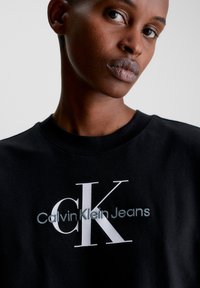 Calvin Klein Jeans ARCHIVAL MONOLOGO RELAXED TEE - Marškinėliai su spaudiniu - ck black