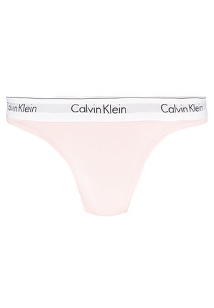 Chiloți tanga roz Calvin Klein cu talie elastică albă, având textul logo negru. Material neted cu design fără cusături și acoperire minimă.