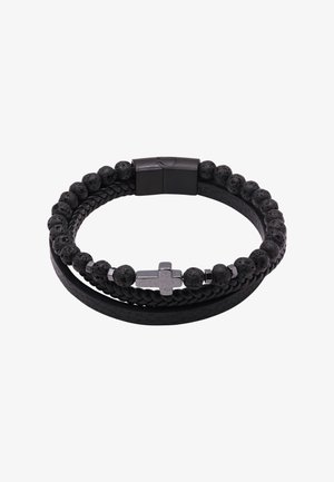 Juodas pintas odinis apyrankė su lavos karoliukais ir metaliniu kryžiumi. Yra magnetinė užsegimas, glotni tekstūra ir cilindriniai karoliukai.