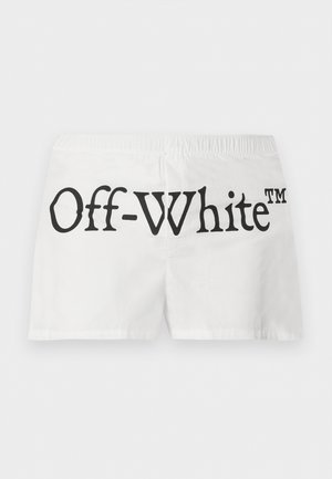 Shorts blancs à taille élastique avec un grand texte noir "Off-White™" imprimé dans le dos.
