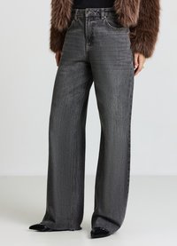 Jeans a vita alta, gamba larga, in denim grigio scuro. Presentano una texture sottile, il classico design a cinque tasche e un dettaglio orlo sfrangiato.