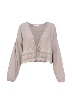 Hellgraue kurz geschnittene Bluse mit langen Ärmeln, die eine Vorderbinde, Spitzenbesatz am Saum und einen strukturierten, weichen Stoff aufweist.