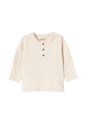 Cream-colored baby long-sleeve shirt with round neck and three dark buttons on front placket, size 6 months (67 cm).