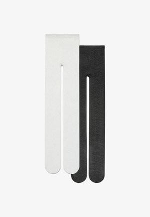 Leggings bianchi e neri realizzati in materiale morbido ed elastico. Il paio nero ha una texture mottled, mentre quello bianco è uniforme. Entrambi presentano una vestibilità standard.