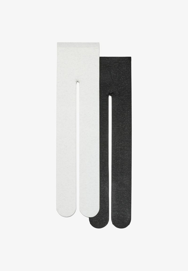 Czarno-białe legginsy wykonane z miękkiego, elastycznego materiału. Czarne legginsy mają lekko drobnoziarnistą strukturę, natomiast białe są gładkie. Oba modele charakteryzują się standardowym krojem.