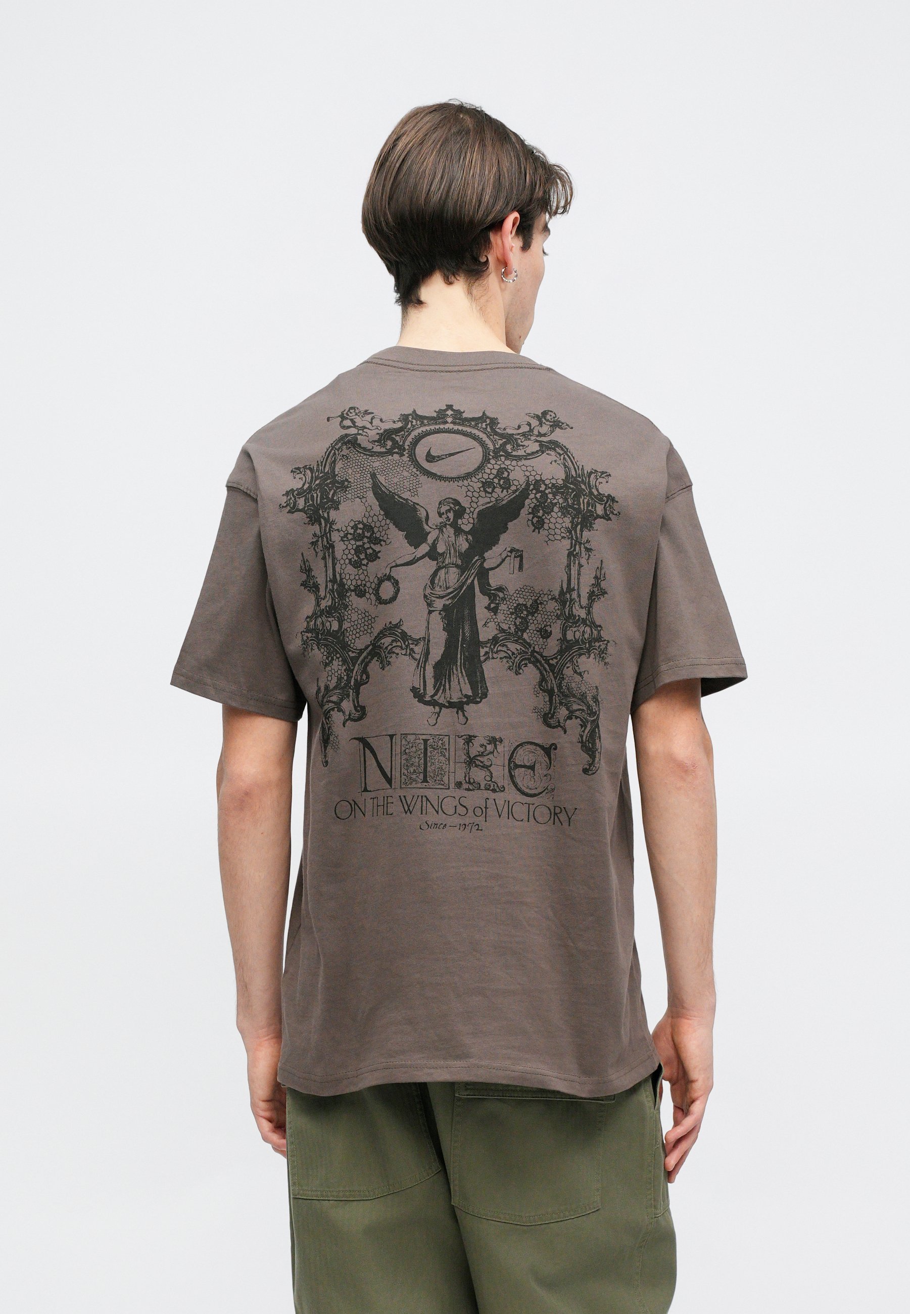 black and brown nike shirt