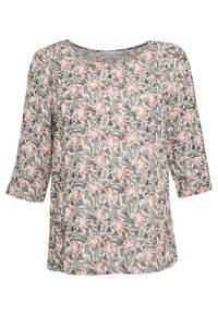 Blouse florale à manches trois-quarts, ornée d'un motif de fleurs roses, blanches et noires sur un fond beige. Tissu doux et léger.