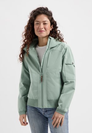 Lichtgroene, ritsjack met een hoge kraag, elastische manchetten en een gestructureerde tailleband. Voorzien van zijzakken en een strakke, minimalistische uitstraling.