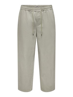 Bež kavbojke s casual slogom, elastičnim pasom in vrvico za zavezovanje, z ravnim krojem, brez vidnih žepov, iz lahkega blaga.