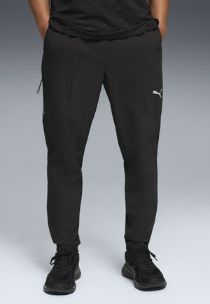 PUMATRAININGSHOSE - Pantalon de survêtement - black