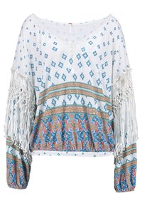 Biała bluzka z niebieskimi geometrycznymi wzorami, misterną pomarańczowo-niebieską bordiurą i białym frędzlowym wiązaniem na rękawach. Luźny krój.