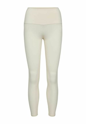 Lyse beige høj talje leggings i fuld længde med glat stof og flade sømme, vist på hvid baggrund.