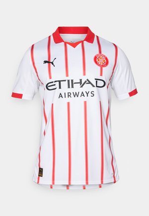 Hvid fodboldtrøje med røde lodrette striber, rød krave og PUMA-logo. Viser "ETIHAD AIRWAYS" i sort over brystet.