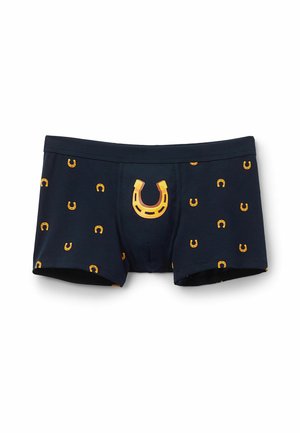Dunkelblaue Boxershorts mit einem auffälligen gelben Hufeisen-Design vorne und verstreuten kleinen gelben Hufeisenmustern überall.