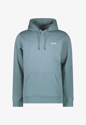 Hoodie aus weich, hellblauem Stoff. Verfügt über eine Fronttasche, Rippbündchen und Kordeln. Text "SINCE 1982" in Weiß gedruckt.