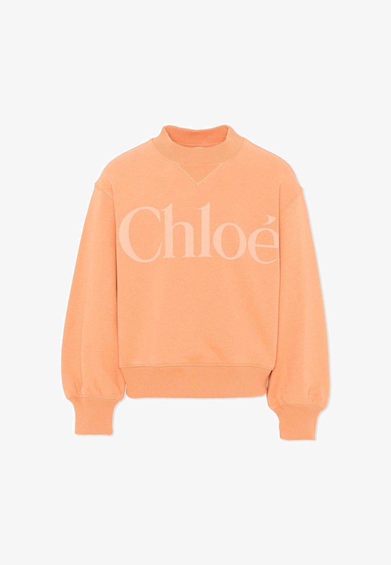 Bluza w kolorze brzoskwiniowym z prążkowanym kołnierzem, mankietami i dołem, z dużym, jasnoróżowym logo "Chloé" na piersi.