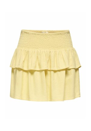 Hele kollane seelik, millel on õmmeldud kõrge vöökoht ja kihiline volanguline detail, põlvekõrgune, valmistatud pehmest kangast.