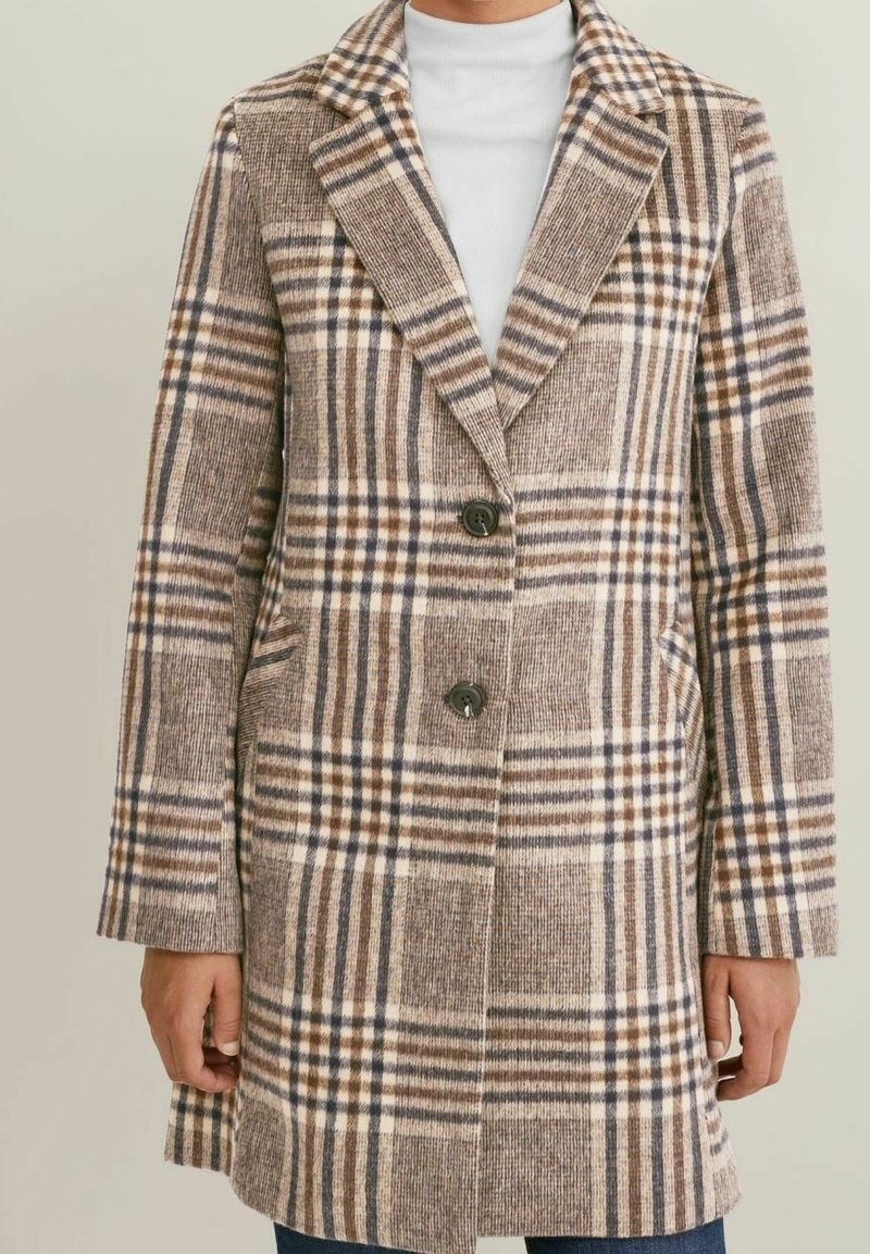 Abrigo de lana mezclada con un diseño de cuadros en tonos beige y marrón, con solapas muesca, dos botones y bolsillos laterales. Tejido texturizado.