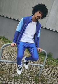 Under Armour CHALLENGER - Tuta - tech blue/white