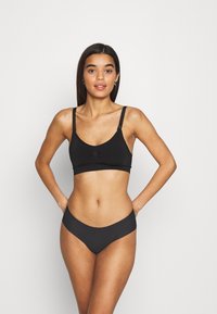 Puma - SEAMLESS HIPSTER 2 PACK - Alushousut - black Pienoiskuva 1