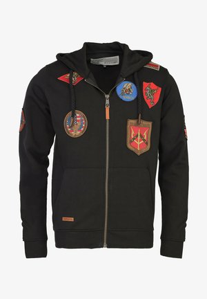 Schwarz zip-up Hoodie aus weichem Stoff, mit verschiedenen gestickten Patches in Farben wie Rot, Blau und Braun. Mit Kapuze und Kordelzug.