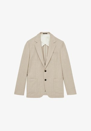 Blazer beige avec une finition texturée, design à un seul bouton, deux poches avant et boutons noirs. Doublé d'un matériau blanc contrastant.