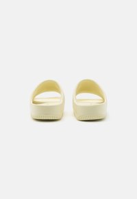 Nike Sportswear CALM - Mules - alabaster