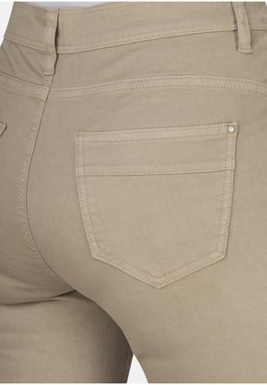 Beige, dehnbare Baumwollmischungshose mit einem braunen Bund. Sie verfügt über eine einzelne Gesäßtasche mit Stichdetails und einem metallischen Druckknopfakzent.