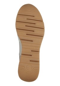 Semelle en caoutchouc beige avec un motif de grip texturé. Le design comprend des rainures et des crêtes profondes pour une meilleure adhérence. Pas de marquage visible.