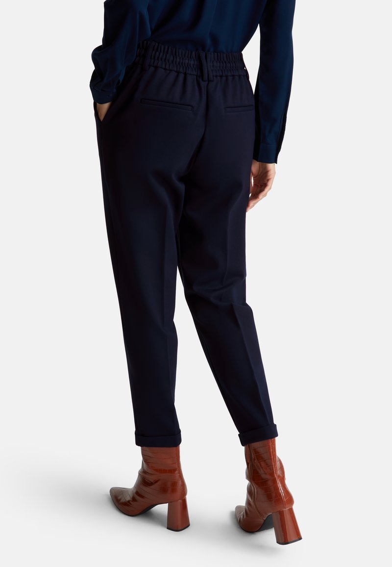 United Colors Of Benetton Pantalon Velours Stretch Mixte - Logo Brodé, Coupe Ajustée