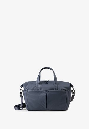 Navy fabric duffel bag with dual top handles, detachable shoulder strap, two front pockets, and a zippered closure. Smooth texture.