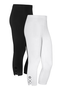 Svart och vit capri leggings med resårmidja. Den svarta modellen har en slät yta, medan den vita har en korsande detalj vid fållen.