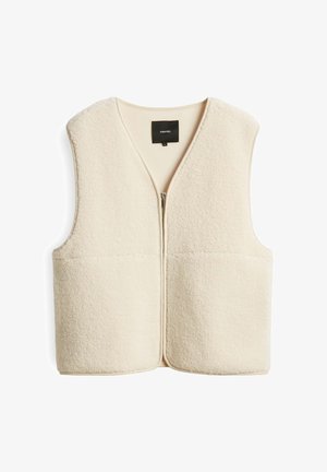 Fleece vest in crèmekleur met een ritssluiting aan de voorkant, wijde armsgaten en een V-hals. Beschikt over twee voorkruiszakken en een zachte textuur.