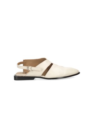 White leather flat shoe with pointed toe, open sides, and adjustable back strap with buckle on a black sole.