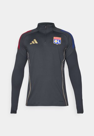 Black athletic zip-up jacket with long sleeves, featuring red and blue shoulder accents, gold piping, and the Olympique Lyonnais logo.