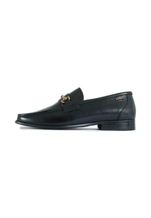 Black leather men's loafer with gold-tone metal bit detail and low heel on white background.