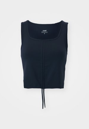Marinblå kort ärmad tanktop med fyrkantig halsringning, tillverkad av ett glatt tyg, med en justerbar knut vid fållen och inga synliga dekorationer.
