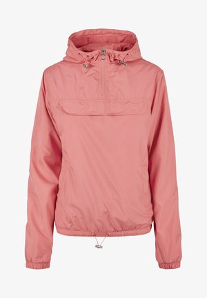 Világos rózsaszín pulóverdzseki kapucnival, elülső zsebből és állítható húzózsinórokból a gallér és az alsó szegély mentén. Könnyű, sima szövetből készült.