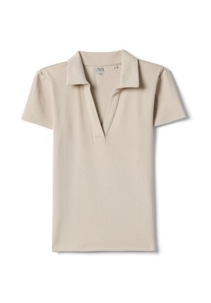 Polo beige de manga corta acanalado con cuello en pico profundo y etiqueta de OVS sobre fondo blanco.