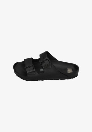 Black slide sandal with two adjustable buckles. Made from synthetic material, featuring a textured footbed and a contoured sole for comfort.