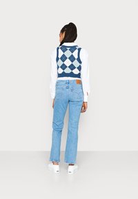 Levi's® LOW PITCH BOOT - Calças de ganga bootcut - napa sun