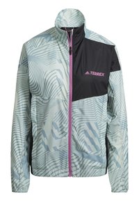 Leichte Jacke mit einem mehrdimensionalen Streifenmuster in Pastellblau und Schwarz. Verfügt über einen hohen Kragen, einen Reißverschluss und pinke Akzente.