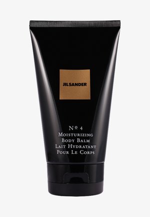 Zwarte kunststof tube met een matte afwerking, voorzien van een gouden vierkant logo en witte tekst. Bevat vochtinbrengende lichaamsbalsem.